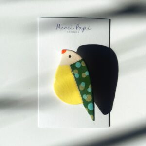 Broche oiseau jaune céramique